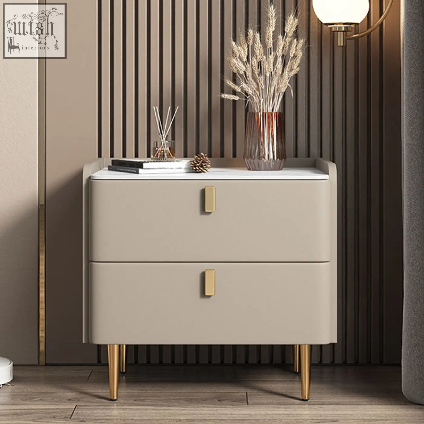 Beige cunha bedside table with two drawers, gold-tone rectangular handles, and slender legs for stylish storage