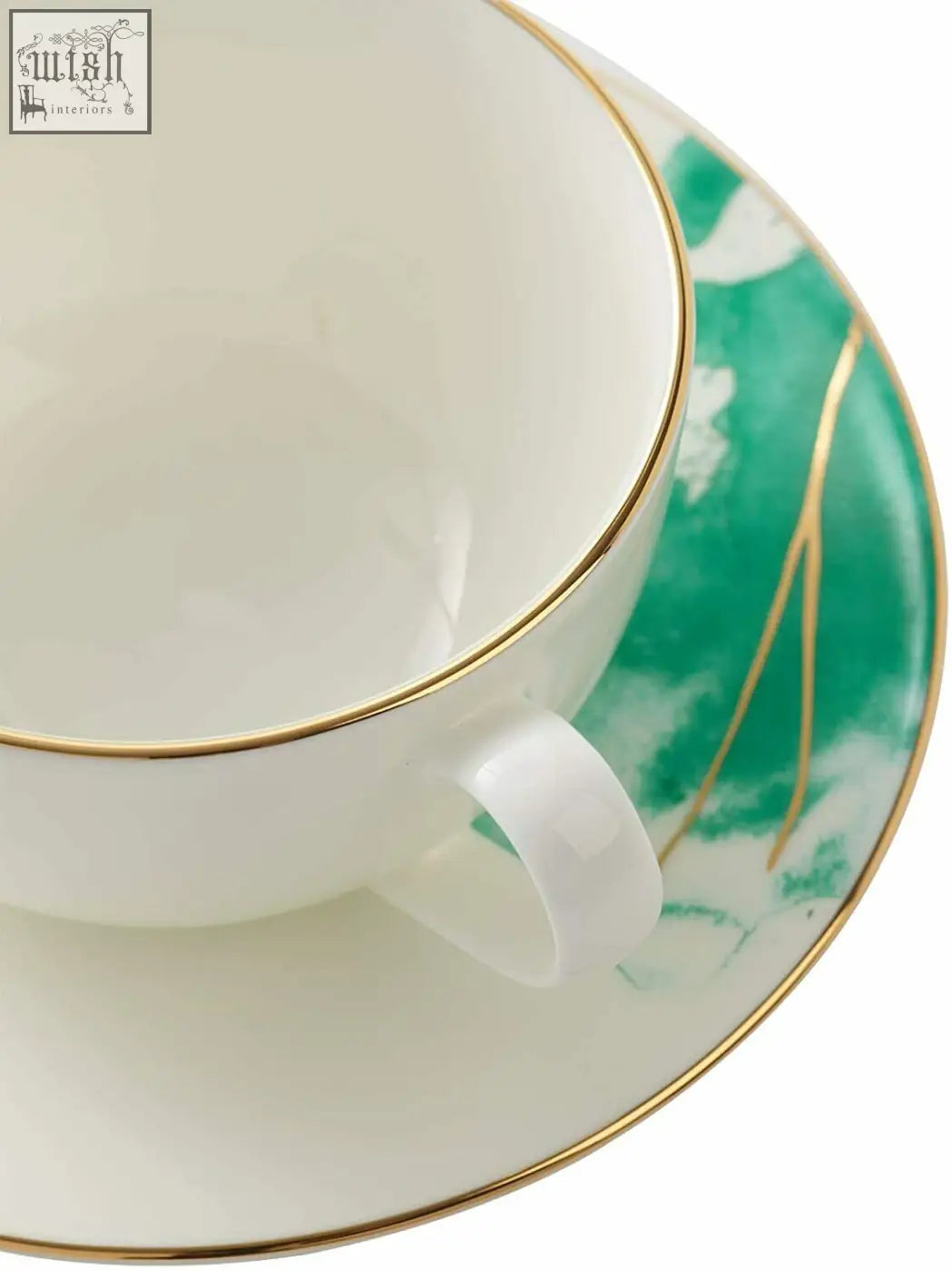 A premium porcelain white teacup and saucer set with gold banding and green floral patterns 200ml bone china
