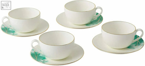 Set of four white premium porcelain teacups with gold banding and green botanical patterns on matching saucers