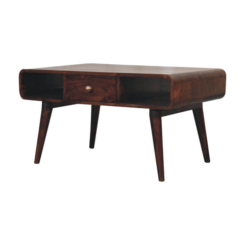 Dark brown curved california walnut coffee table with single drawer and tapered legs made from solid mango wood