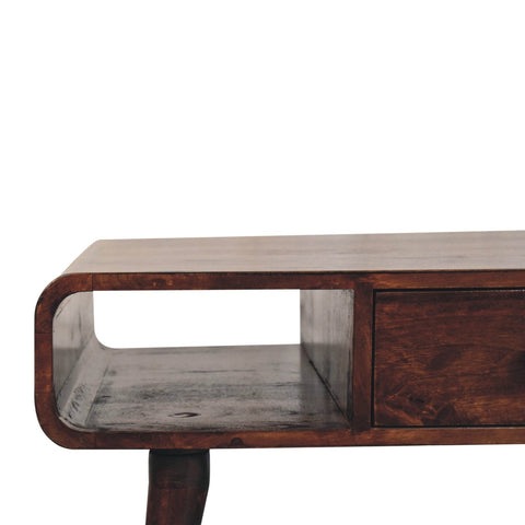 Dark brown curved california walnut coffee table with open shelf made from solid mango wood for stylish storage