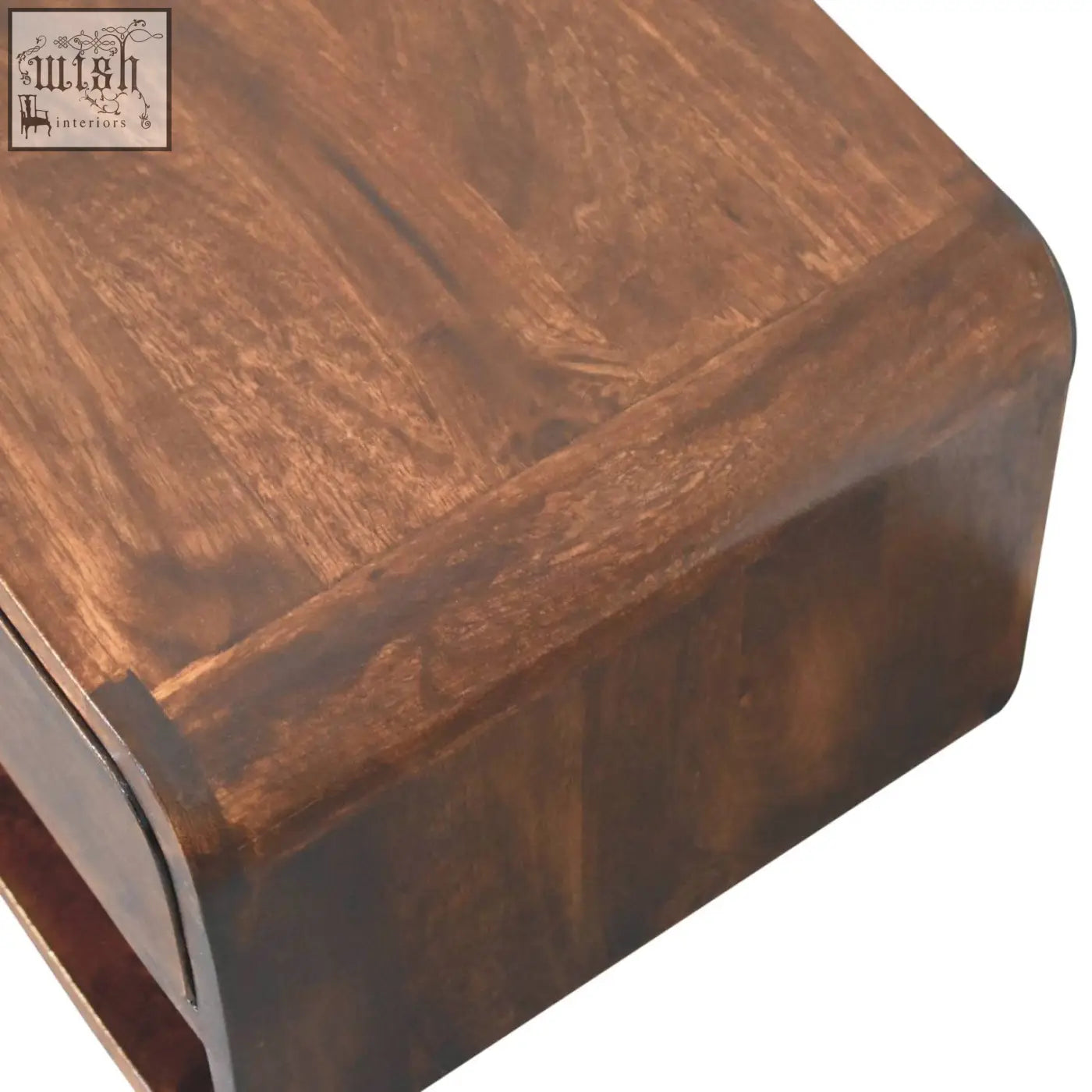 Curved california walnut wall mounted bedside with open slot and rich brown solid mango wood coffee table finish
