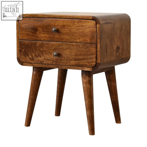 A warm brown wooden curved chestnut bedside table with two drawers and tapered legs for bedroom use