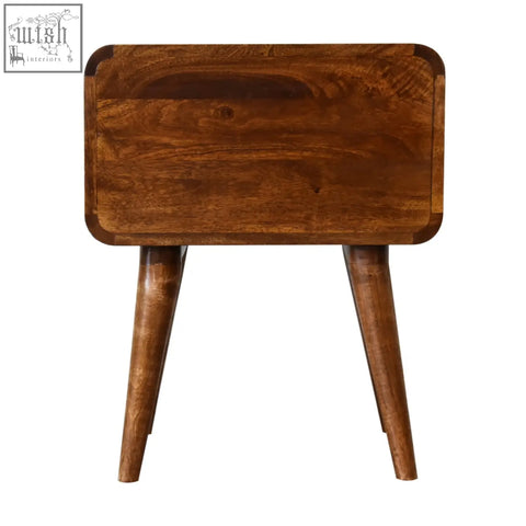 A warm medium brown wooden curved chestnut bedside table with smooth finish and rounded corners