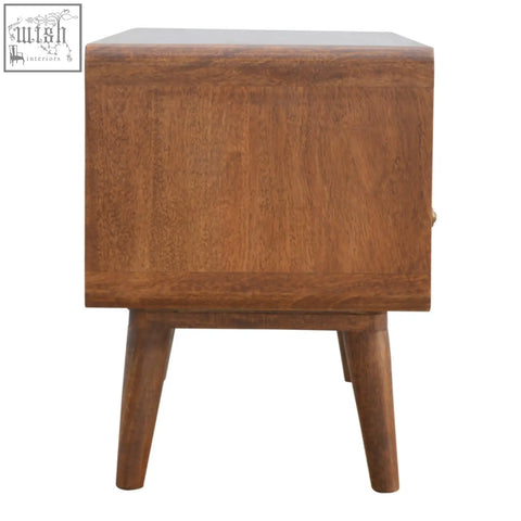 A warm brown curved chestnut nightstand with smooth polished chestnut finish and tapered mango wood legs