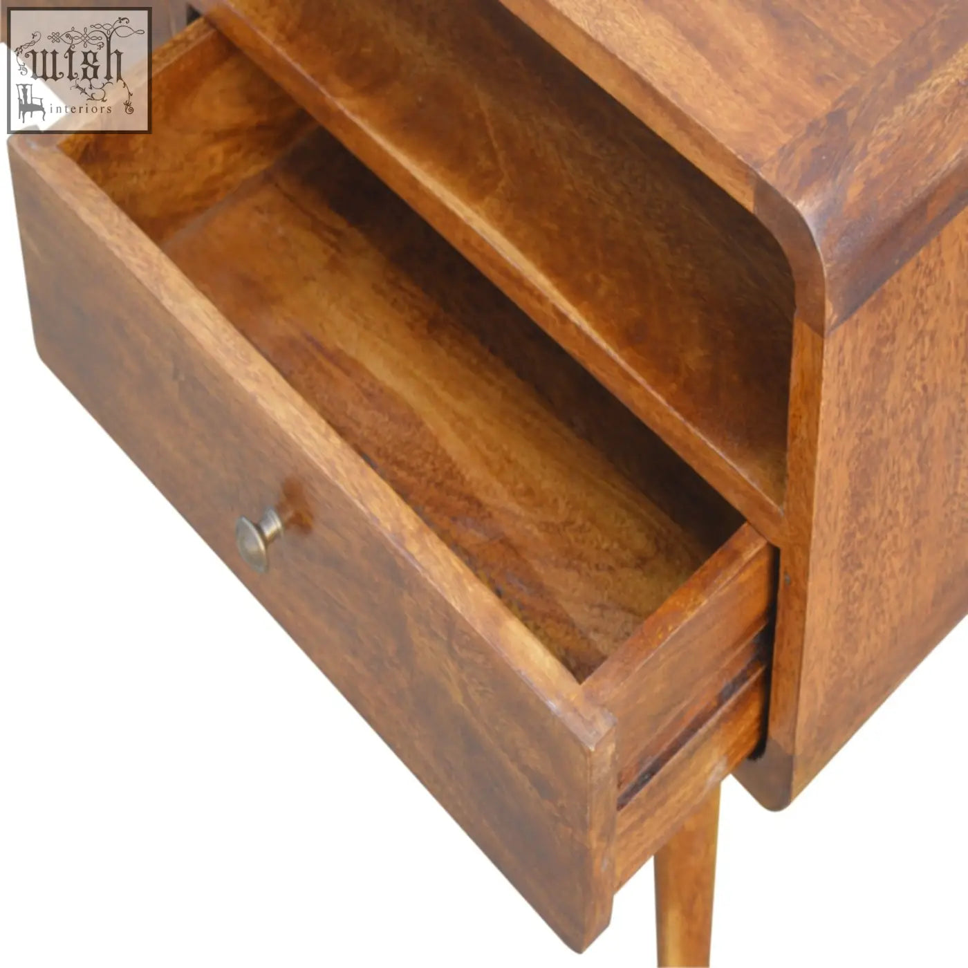 Warm-toned curved chestnut nightstand with a single drawer and slender legs in chestnut finish mango wood