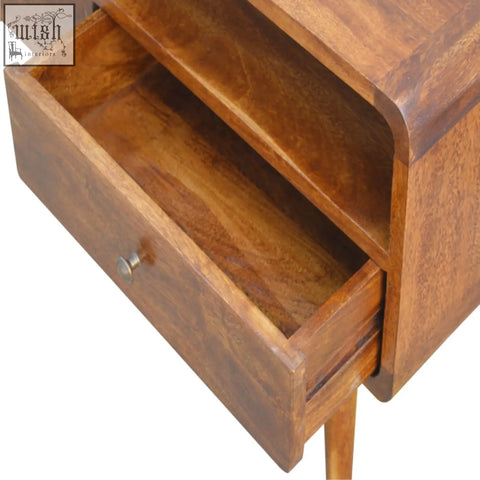 Warm-toned curved chestnut nightstand with a single drawer and slender legs in chestnut finish mango wood