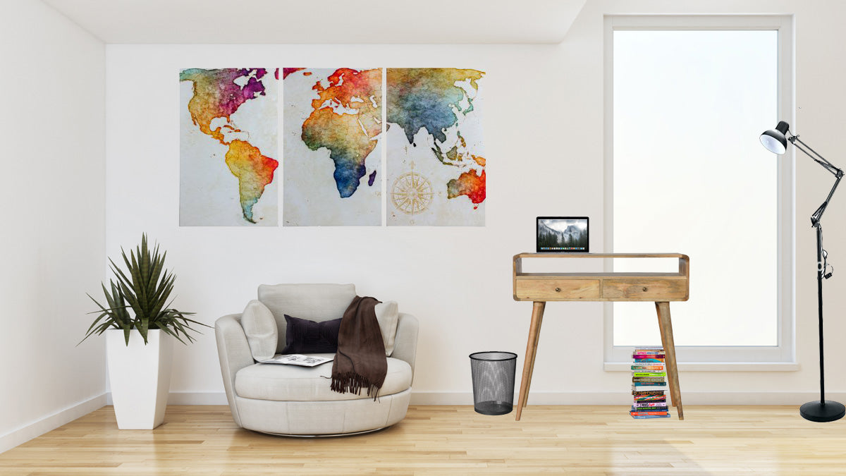 Curved oak-ish console table with four scandinavian-style legs featuring a vibrant rainbow watercolor world map triptych and compass rose design