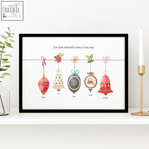 Black-framed holiday wall art print with custom family ornaments in red beige teal brown and pink for family gifts