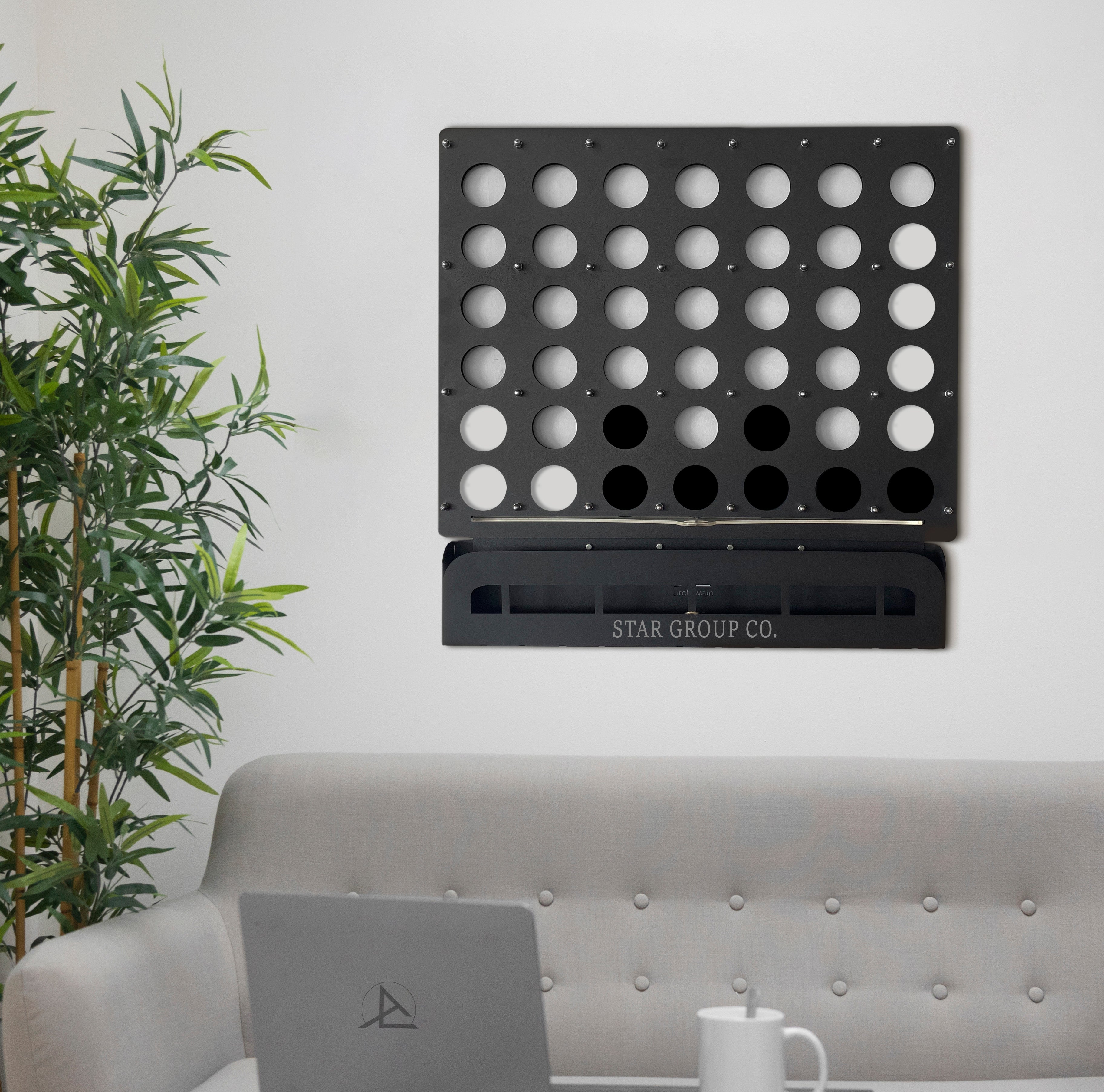 Black metal connect four wall game with circular holes and sleek modern design for customized four wall play