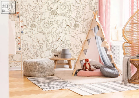 A cozy beige woven pouf with textured surface on wooden floor complements monochrome animals kids wall mural from contact clickwalls