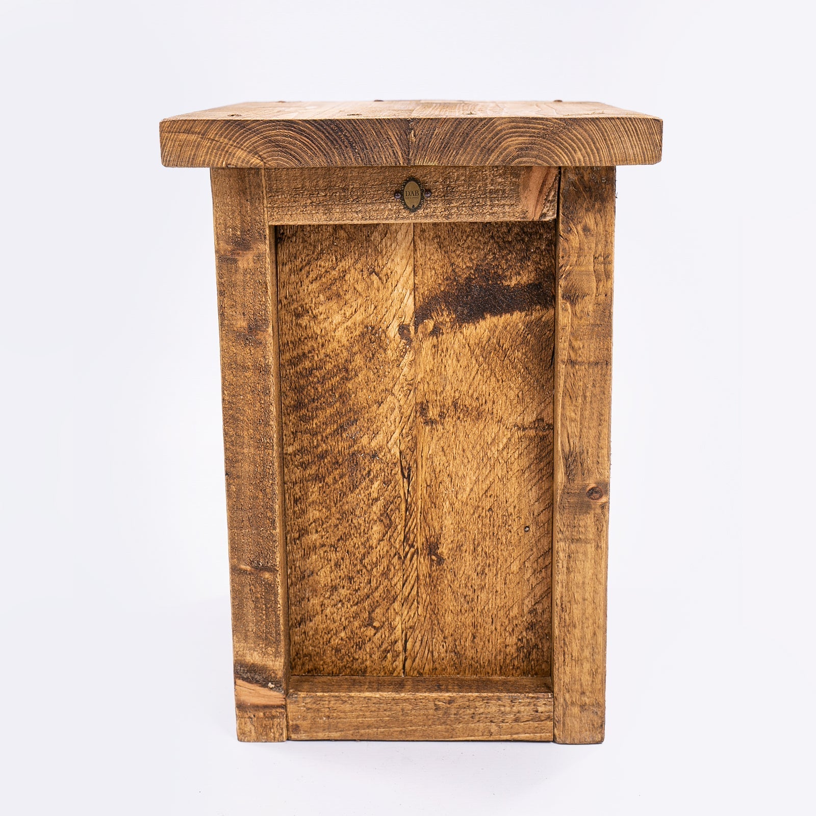 Rustic reclaimed wood cabinet with warm amber finish and visible grain knots fits perfect in dining room or bar stool area
