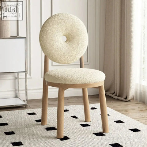 Daiki chair plush cream-colored faux lamb wool with round donut backrest and light wood legs for cozy seating