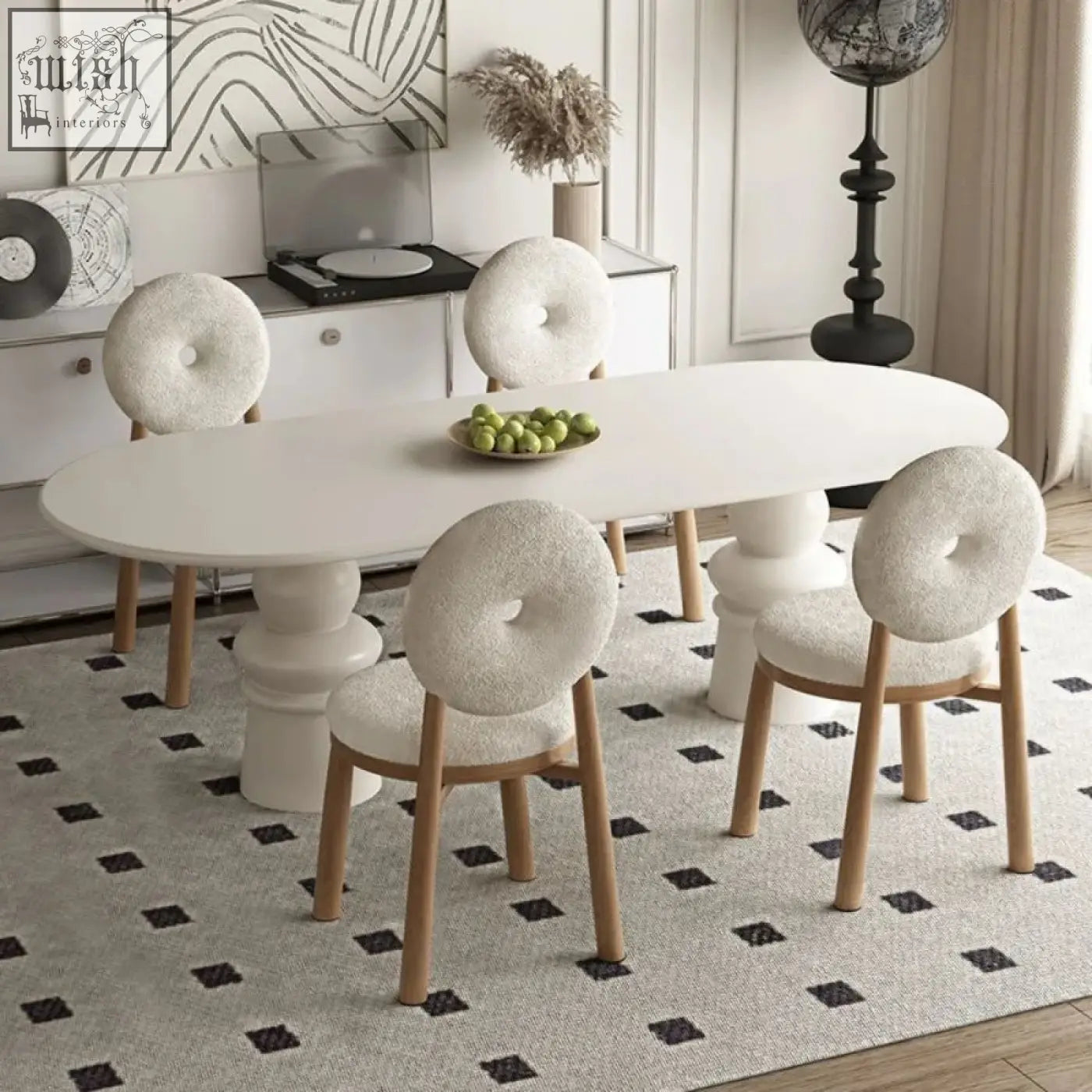 White daiki chair with tufted donut-shaped back and light wood legs upholstered in soft faux lamb wool