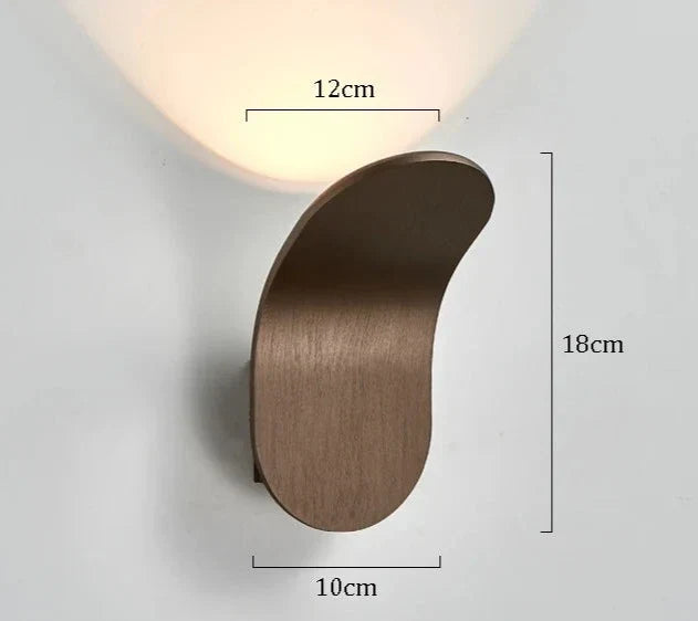 Modern bronze-finished daisuke light wall lights with sleek curved design and warm ambient lighting