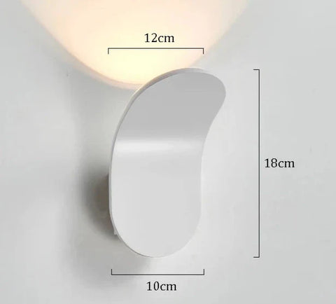 Modern white daisuke light wall lights with sleek curved design and soft diffused lighting mounted on wall