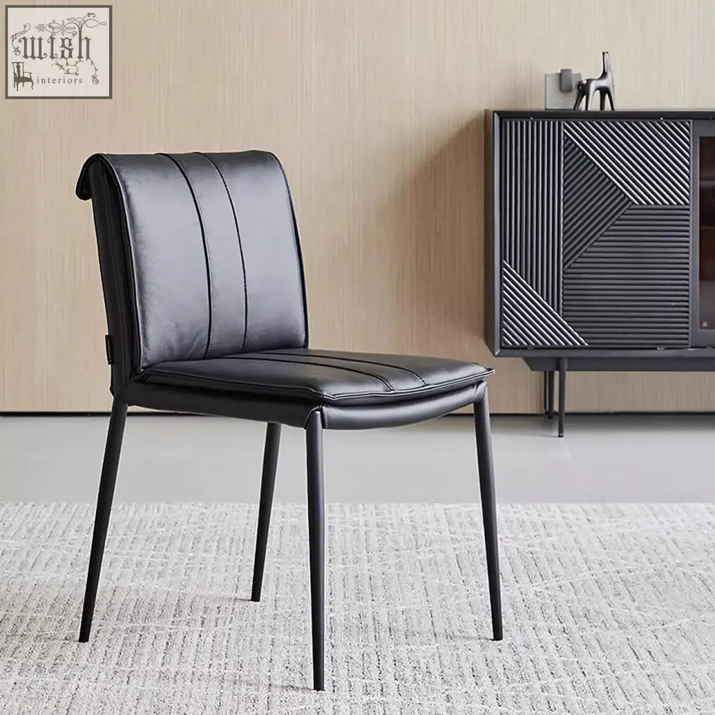 Black leather d’amato dining chair with sleek modern design and thin metal legs perfect for dining room use