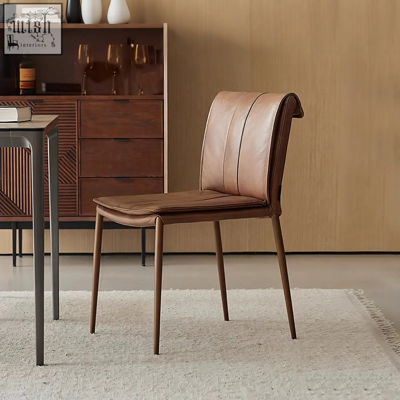 Brown leather d’amato dining chair with a sleek modern design and tapered wooden legs perfect as a dining chair leather option