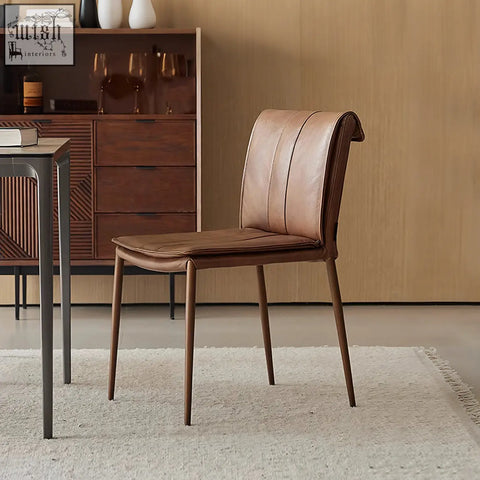 Brown leather d’amato dining chair with a sleek modern design and tapered wooden legs perfect as a dining chair leather option
