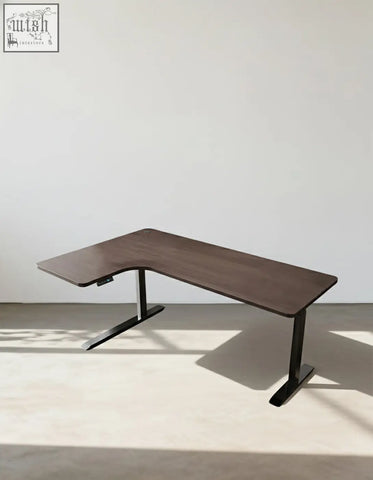 Modern l-shaped damico electric standing office desk with dark wood tabletop and sleek black metal legs for computer corner use