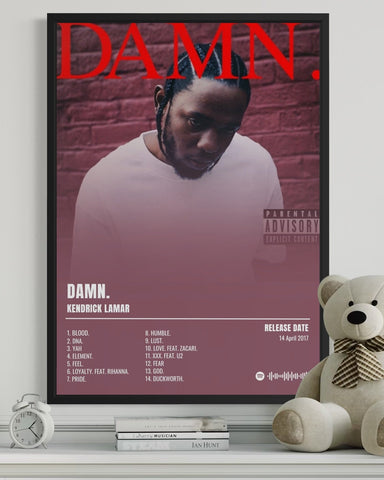 Black-framed kendrick lamar album poster damn with bold red lettering pink purple gradient and spotify barcode details