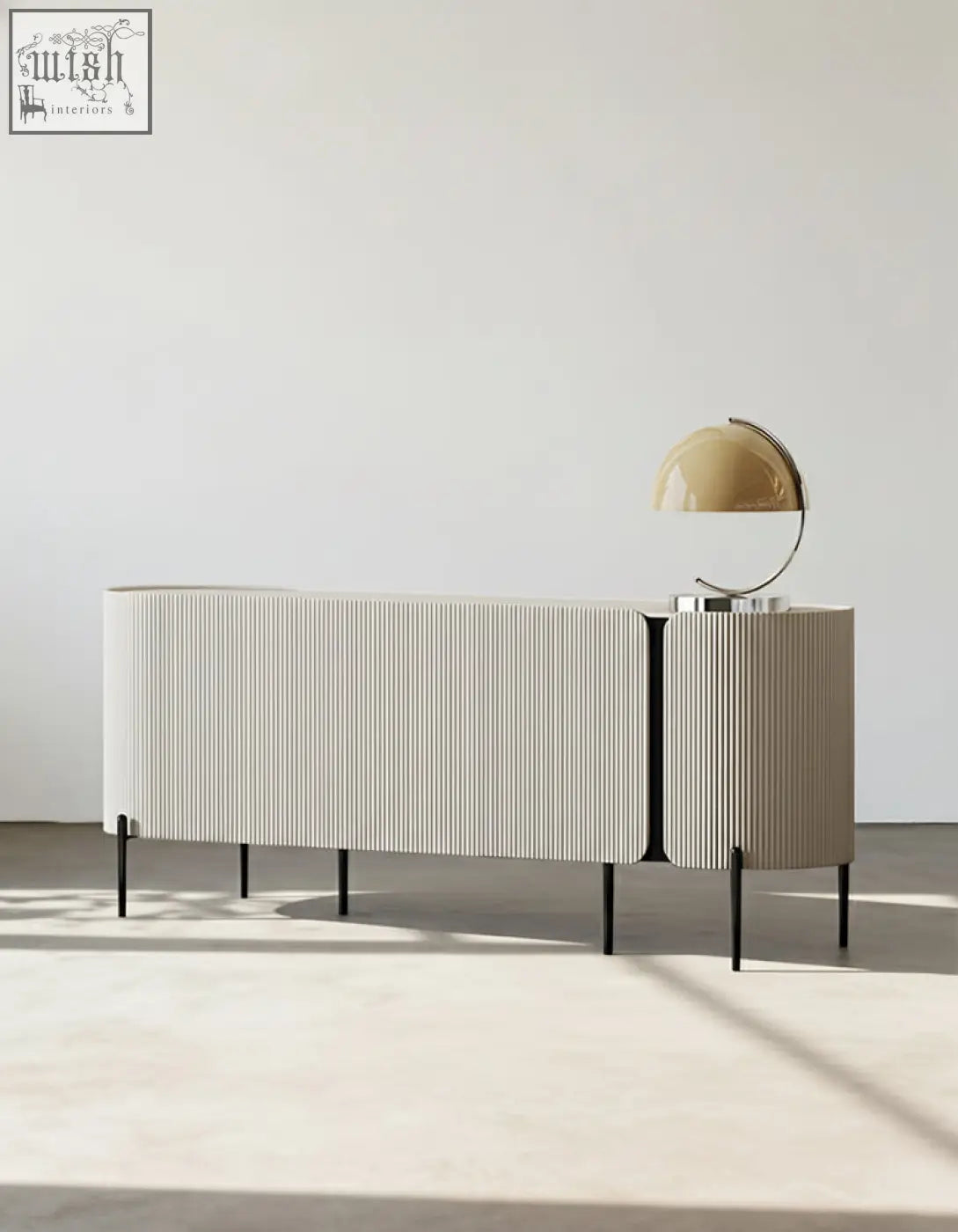 Cream-colored damon sideboard with vertical ribbed wood texture and slender black legs perfect blend for dining area
