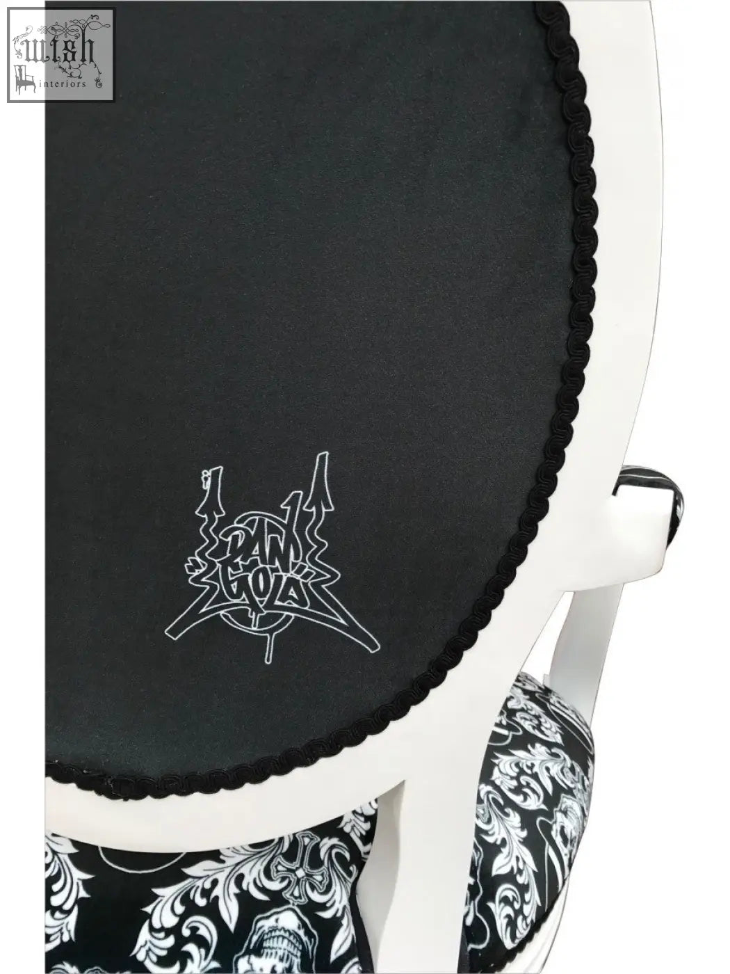 Dan gold bowler arm chair with black upholstery white embroidered panic logo and braided trim