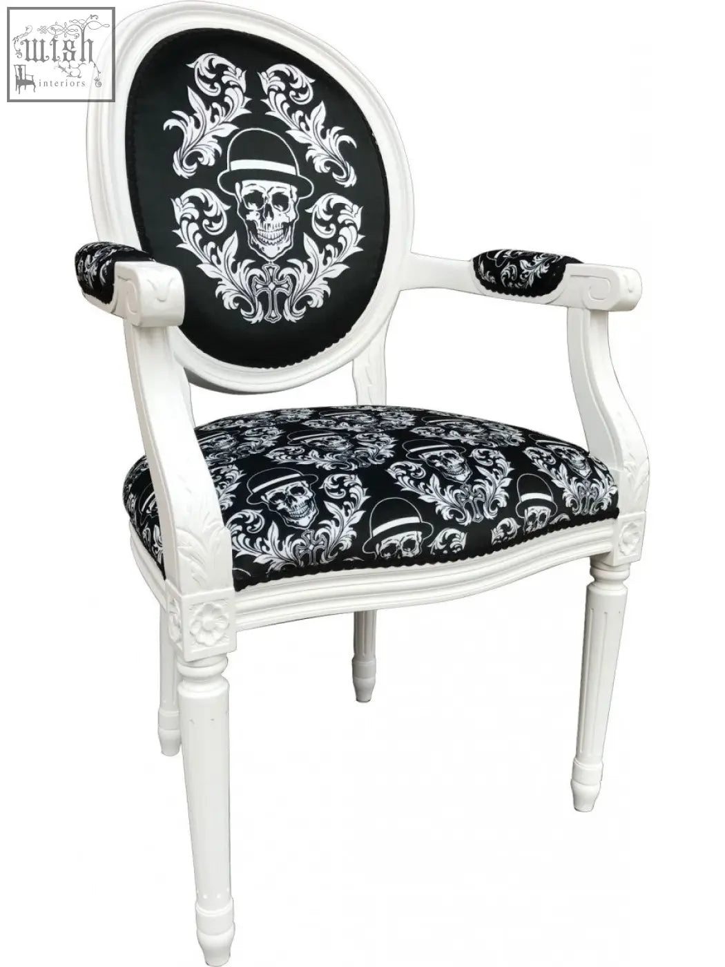 White ornate dan gold bowler arm chair with black skull pattern upholstery on seat and back