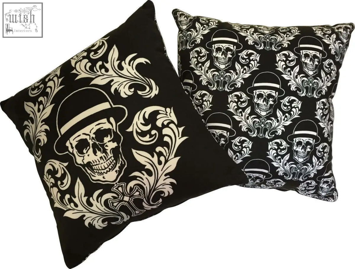 Black dan gold bowler cushions with white skull and floral patterns featuring single and repeating skull designs