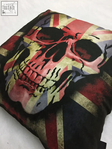 Dan gold union skull cushion with distressed skull and faded union jack flag in red white and blue tones on square fabric
