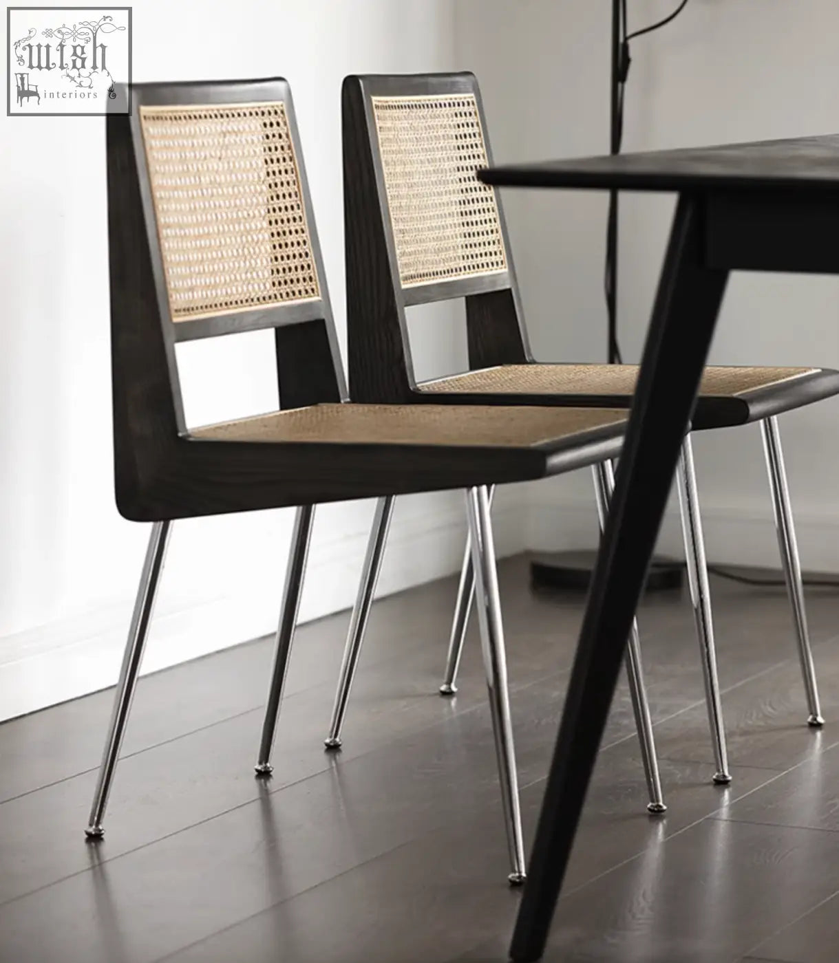Dark wood dana rattan dining chair with woven natural fiber seats and backs on sleek chrome legs for dining use