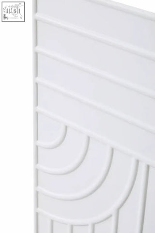 Off-white wall mirror with a white plastic panel featuring raised horizontal lines and concentric curved grooves