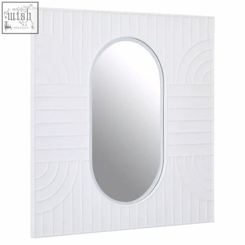 White rectangular off-white wall mirror with oval reflective center and textured geometric patterned frame