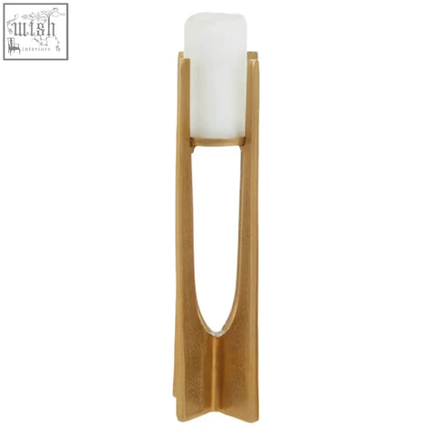 Dante large gold finish candle holder with a gold-toned modern design holding a white cylindrical candle inside