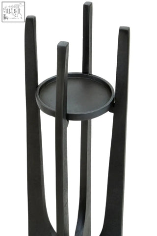 Black metal candle holder with slender curved legs and large grey finish perfect for pillar candles