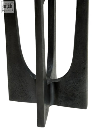 Black metal table leg with geometric cutouts and textured matte grey finish for dante small washed candle holder