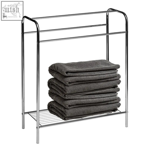 Dara floor standing towel stand with chrome finish, three bars, wire mesh shelf holding folded dark gray towels