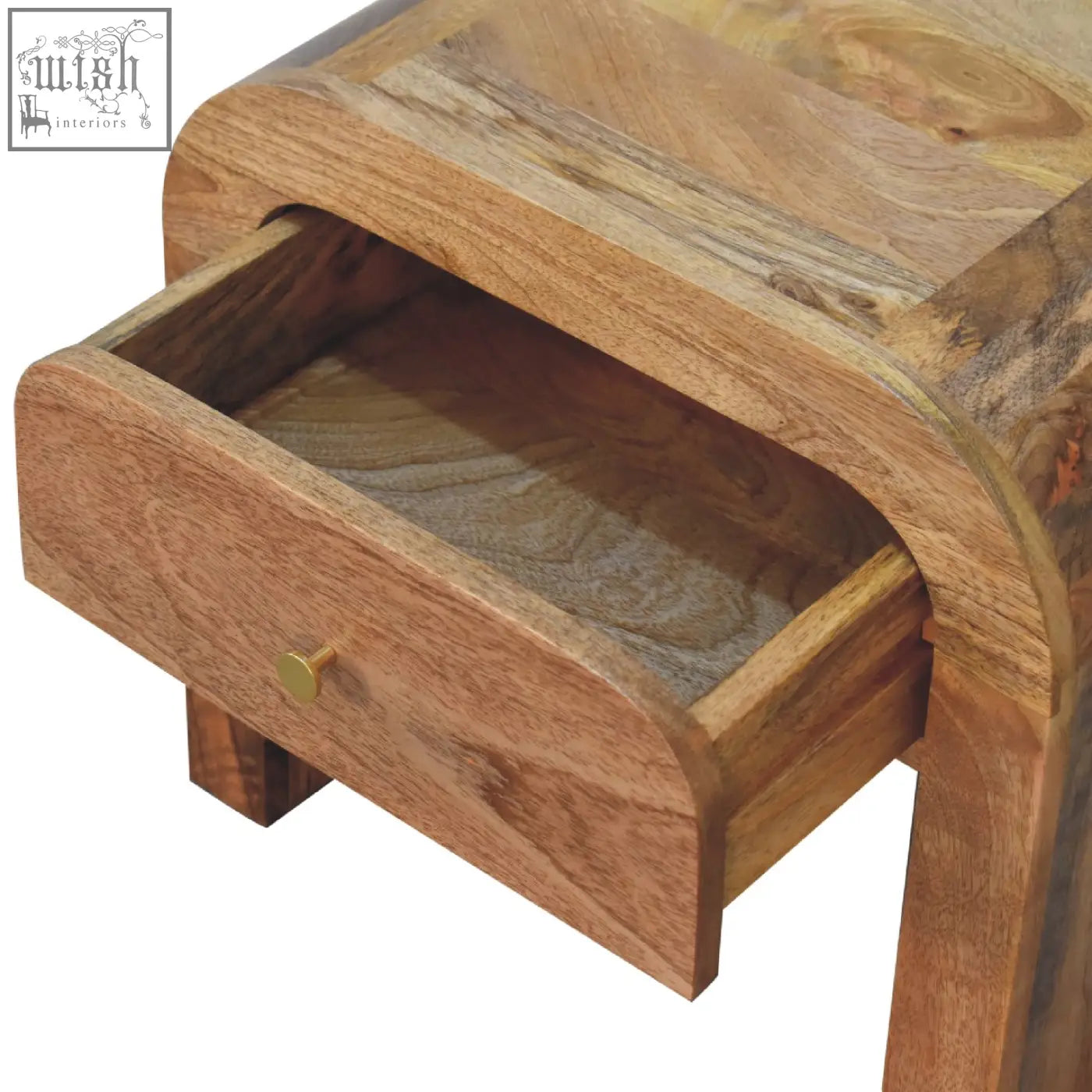 Curved darcy bedside table in solid mango wood with natural grain and brass knob single drawer bedside table