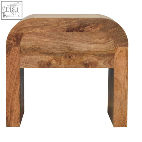 Rustic darcy bedside table with curved top solid mango wood warm brown tones and sturdy rectangular legs