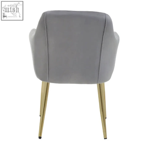 Darcy grey velvet dining chair with slender gold-tone metal legs and soft grey velvet upholstery