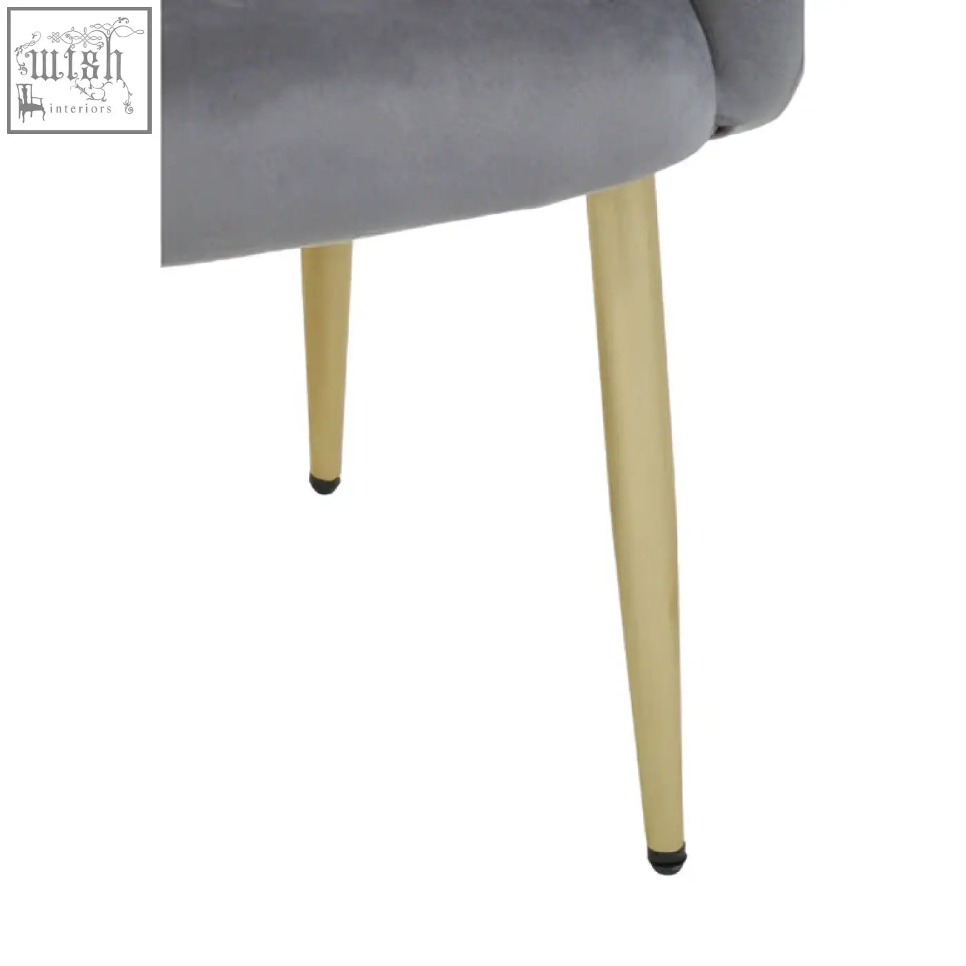 Darcy grey velvet dining chair with slender gold legs and black caps for a stylish velvet dining experience