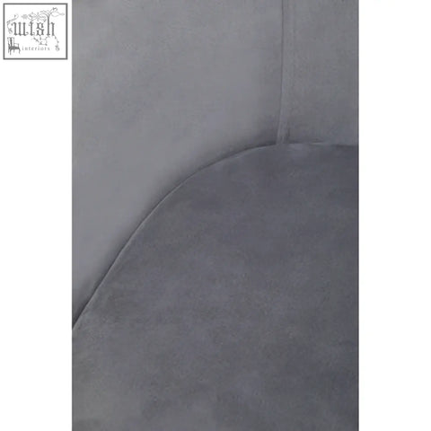 Gray suede chair cushion with plush texture and clean seams on darcy grey velvet dining chair for velvet dining chair use