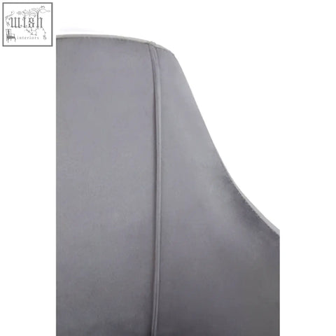 Back of darcy grey velvet dining chair with grey velvet upholstery and subtle vertical seam detail