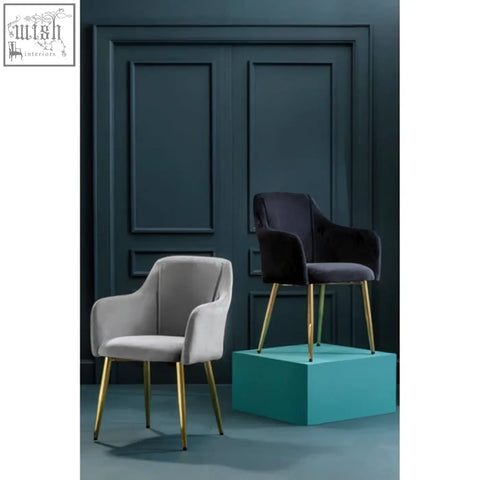 Modern armchair in soft grey velvet with slender gold-tone metal legs perfect as a grey velvet dining chair