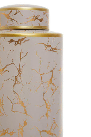 Daria large ceramic jar is a white ceramic tea canister with a gold rim and delicate gold crackle patterns