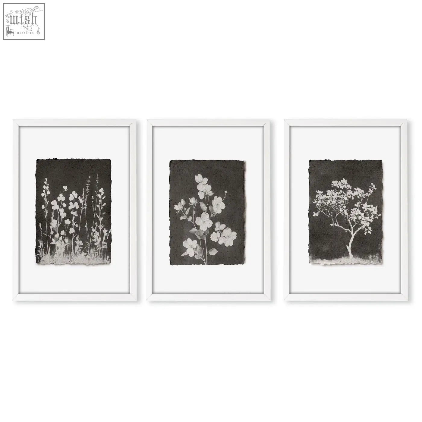 Set of three framed botanical wall art prints with white floral silhouettes on dark brown wall art for brown wall art decor