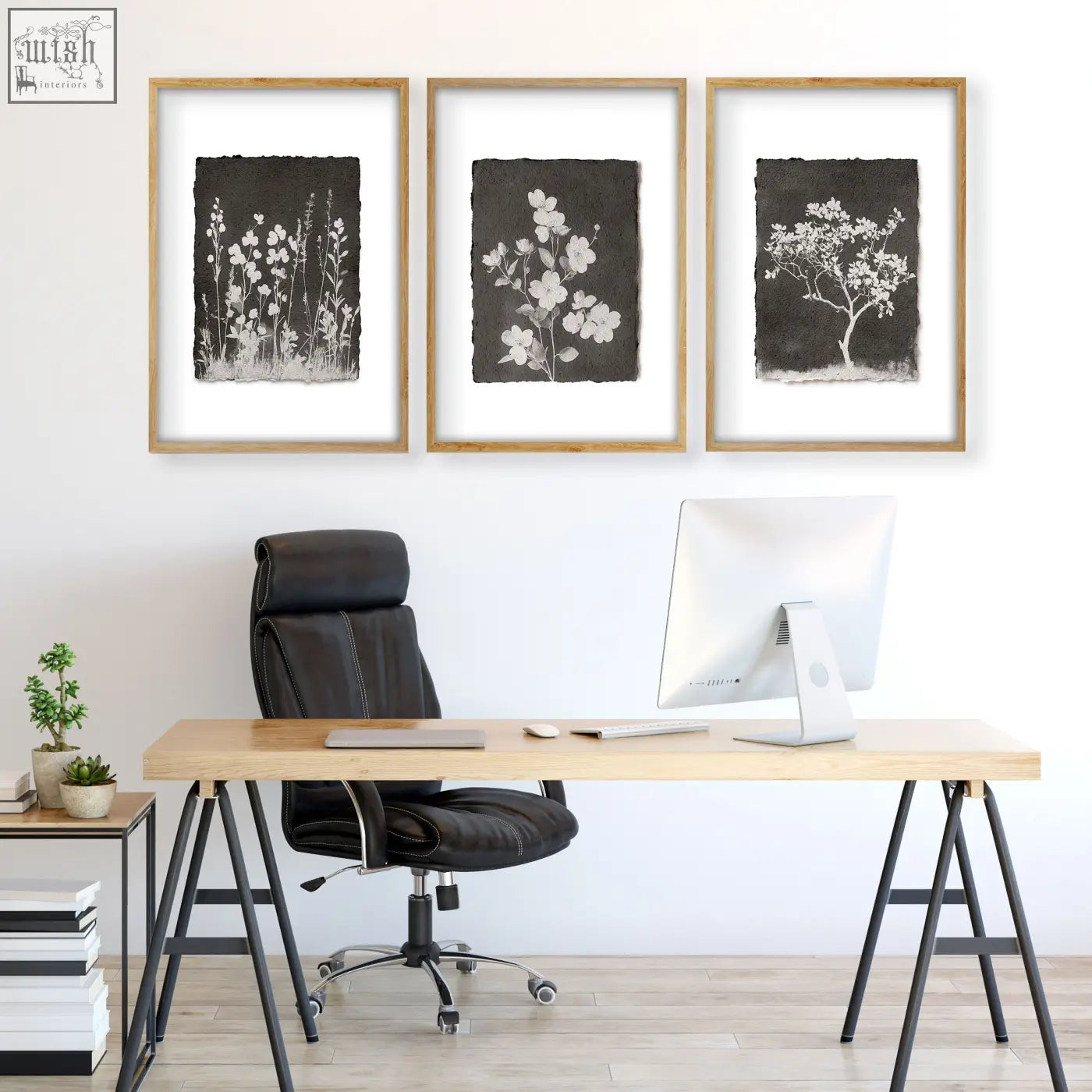 Set of three brown wall art prints featuring white floral and tree silhouettes on dark textured paper in light wood frames