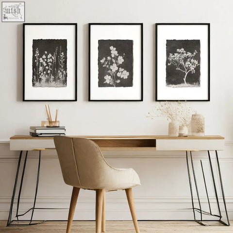 Three black and white botanical wall art prints in thin black frames perfect for dark brown wall art decor
