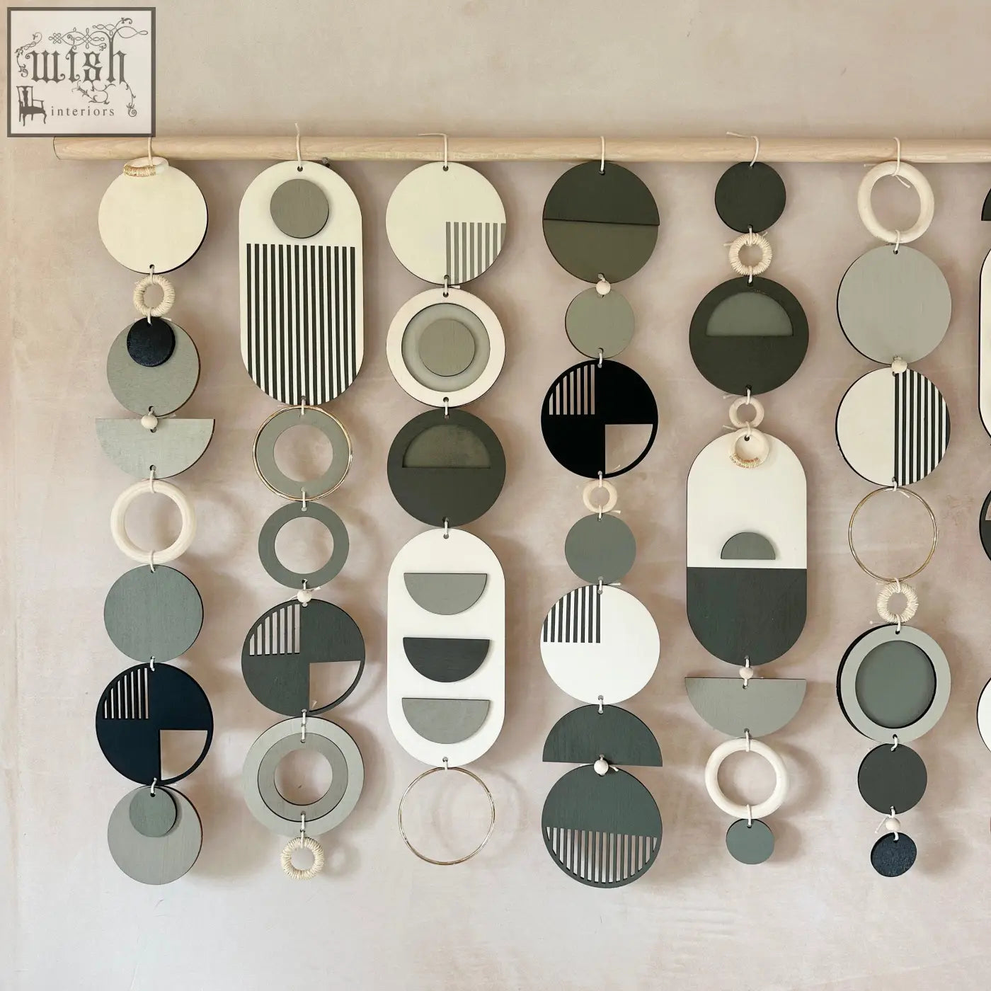 Modern wall art with layered matte white gray black and olive green geometric shapes for minimalist home decor