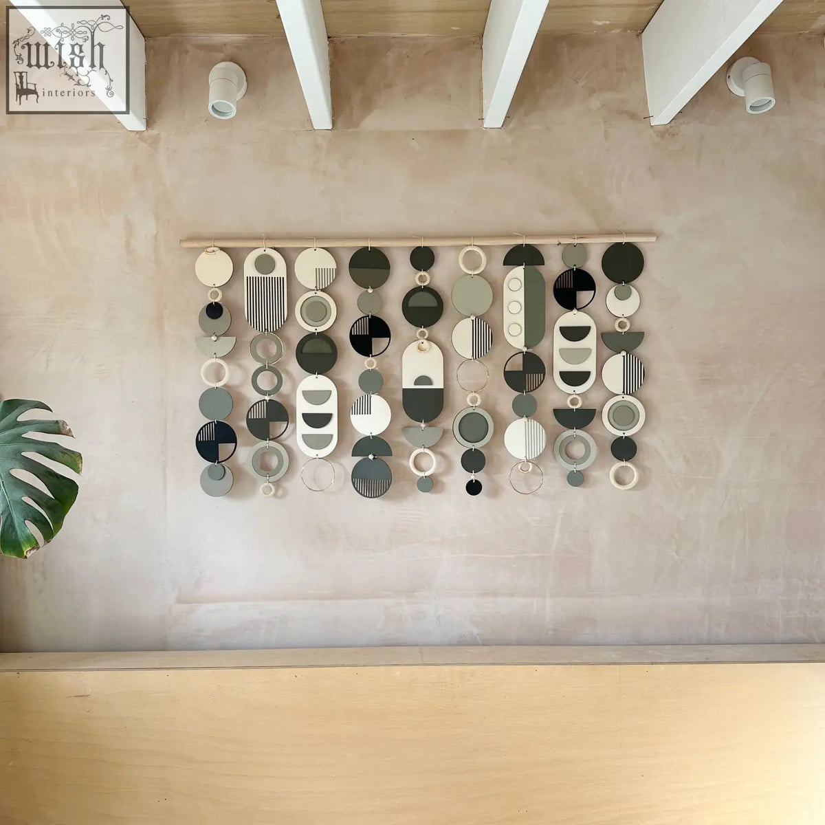 Dark modern wall art with matte black white gray and olive green geometric shapes for minimalist home decor